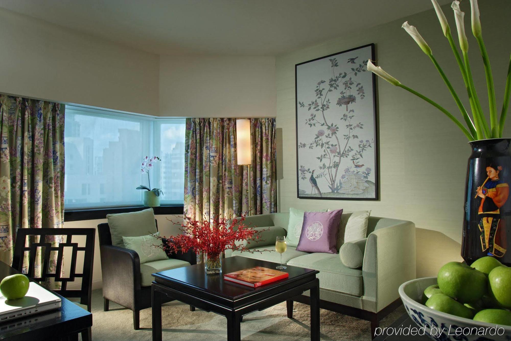 Orchard Hotel Singapore Room photo A living room in a suite at the Mandarin Oriental, Hong Kong
